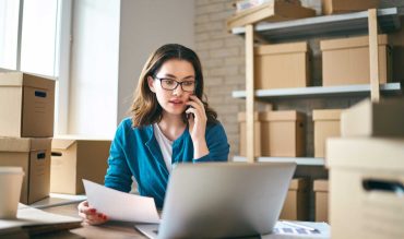woman-is-working-at-warehouse-for-online-store-37BUJHQ.jpg